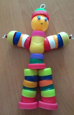 a colorful toy sitting on top of a wooden table