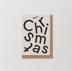 a greeting card with the words merry chrommas on it in black and white