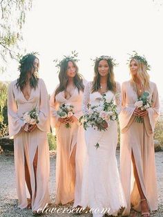 the bridesmaids are all dressed in long dresses