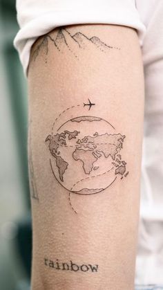 a woman's arm with a tattoo on it that says, i love the world