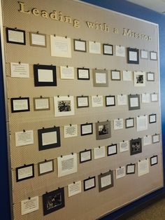 a bulletin board that has some papers pinned to it with words and pictures on it