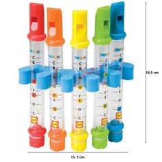 a group of different colored plastic tubes with numbers on the bottom and one in the middle