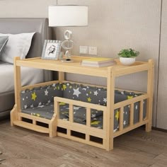 a small wooden bunk bed next to a night stand