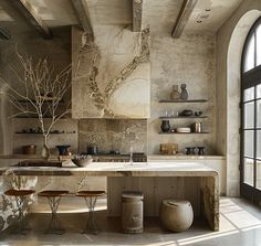 a large kitchen with marble counter tops and an island in front of a window that looks out onto the outdoors