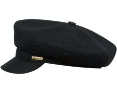 a black hat with a gold label on the front and side, sitting against a white background