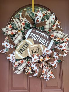 a football wreath is hanging on the front door