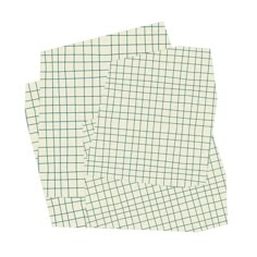 three pieces of paper with green and white squares on them, one is folded in half