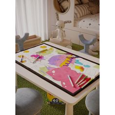 a child's play table with toys on it