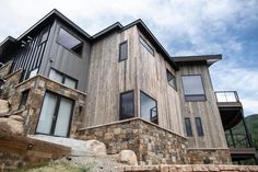 a house that is made out of wood and stone