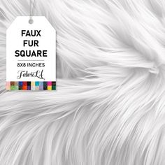 a white fur texture with a tag that says faux four square 8x8 inches