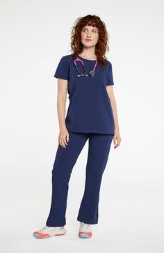 It’s not our job to make scrubs you’ll wear outside of work, but if we see you wearing the Chelsea Crew Neck at the grocery store - no we didn��’t. Perfect for every day, and anywhere. One chest pocket with a pen pocket Vented hem Contrast bar tack detail Printed positive mantra FABRIC + CARE DETAILS Preshrunk 78% polyester / 17% rayon / 5% spandex Machine wash with like colors, tumble dry Imported MODEL INFO Nurse Things, Basic Shorts, Top For Women, Scrub Tops, A Pen, Contrast Stitch, Small Tops, Grocery Store, Chest Pocket