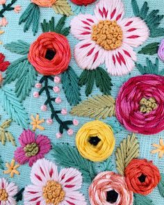 an image of colorful flowers on a blue background with text overlay that reads, how to make beautiful flower embroiderys