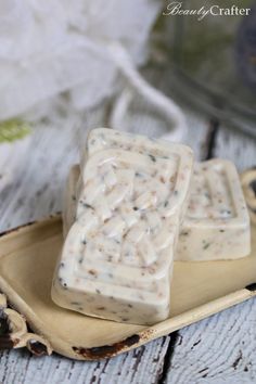 two pieces of soap sitting on top of a plate