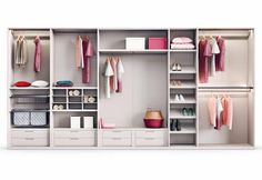 an open closet with clothes, shoes and other items on shelves next to each other