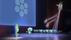 two animated characters are standing on a stage in front of a projection screen, while another character stands behind them