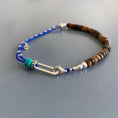 Bluebird Unisex  Handmade Bracelet - 925 Sterling Silver - Turquoise - Tiger eye Men Beaded Jewelry, Sterling Silver Bracelets With Turquoise And Silver Beads, Turquoise Sterling Silver Bracelets With Silver Beads, Spiritual Blue Adjustable Sterling Silver Bracelet, Handmade Adjustable Blue Sterling Silver Bracelet, Handmade Bohemian Blue Sterling Silver Bracelet, Adjustable Blue Sterling Silver Bracelet With Silver Beads, Handmade Blue Sterling Silver Beaded Bracelets, Hand-strung Blue Sterling Silver Jewelry