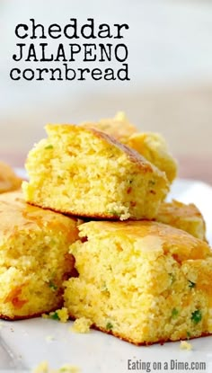 cornbreads stacked on top of each other with the words cheddar jalapeno cornbread