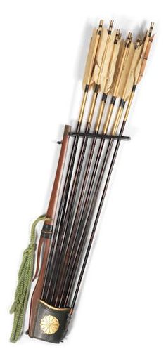 an assortment of archery bows and arrows on a white background with the arrow in it's holder