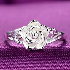 Not every rose has its thorn. Some roses are just beautifully set in a ring detail looking beautiful and polished. This sweet and rosy keepsake is the perfect gift for yourself or a loved one. It is made with premium Sterling Silver. A rose-shaped accent highlights the design. *Choose your size. Our Guarantee: If you a Silver Rose Ring, 3d Rose, Stylish Rings, Wedding Party Jewelry, Rose Ring, Flower Ring, Silver Roses, Jewelry Party, Pure Silver