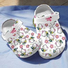 GSU0403403-mockup-3 Cute White Clogs With Round Toe, Playful Plastic Clogs With Round Toe, Cute Non-slip Slip-on Clogs, Cute White Slip-on Clogs, Cute Synthetic Clogs For Playtime, Fun White Slip-on Clogs, Playful White Clogs, White Crocs Hello Kitty, White Non-slip Fun Clogs