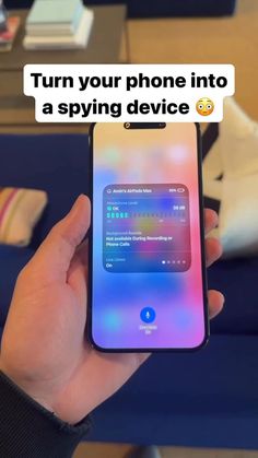 someone holding up their iphone with the text turn your phone into a spy device