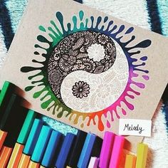 an instagram page with colored crayons on it and the image of a yin symbol