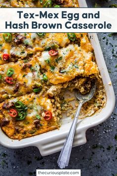 an egg and hash browns casserole in a white dish with a serving spoon