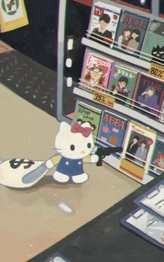 a hello kitty doll is standing in front of a book store with books on the shelves