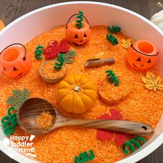 a white bowl filled with rice and pumpkins