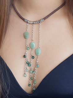 "This boho-inspired necklace is the perfect piece to create a statement. It has an edgy-chic look and can you can wear it casually or dressy.  Bohemian statement necklace featuring beaded fringes made from natural Aventurine and Jade beads, silver-plated Rolo chains, and beads, strung on brown genuine leather cord. The collar will have a 2\" extension rings so you can FINE TUNE the fit.   The only real way to know what size/length you need is to measure your neck :) Choose \"other\" and leave a Bohemian Lariat Choker For Festivals, Bohemian Fringe Choker Jewelry, Bohemian Fringe Choker Necklace, Bohemian Beaded Choker With Adjustable Chain, Bohemian Festival Lariat Necklace With Adjustable Chain, Bohemian Multi-strand Lariat Necklace With Adjustable Chain, Bohemian Lariat Jewelry With Fringe, Bohemian Lariat Necklace With Adjustable Chain, Bohemian Tassel Necklace With Dangling Beads