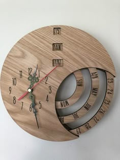 a clock made out of wood with different time zones