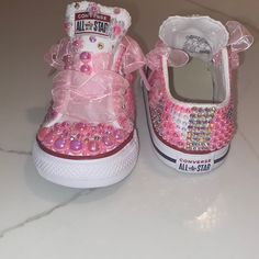 Custom Toddler Converse Designed With Ab Soft Pink Pearls, Ab Flamingo Pearls, Ab White Pearls And Pink And Iridescent Crystals! Paired With Soft Pink Ribbon Shoe Laces! Can Be Designed With Desired Choice Of Color! Allow 3 Business Days To Create Your Masterpiece! Toddler Sizing Up To 11 Bling Baby Shoes Pink, Bling Converse Toddler, Black And White Bling Converse Toddler, Pink Ribbon Shoe Laces, Tie Dye Converse, Glitter Tennis Shoes, Ribbon Shoe Laces, Converse Design, Black High Top Shoes