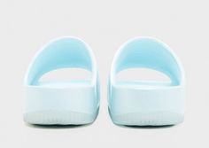 Off-dutys are made better when you slip on these women's Calm Slides from Nike. In a Glacier Blue colourway, these simple slides have a water-friendly outer foam and a contoured design for a smooth, seamless feel. Undefoot, the textured footbed keeps your foot in place, while the rubber outsole offers essential grip on slippery surfaces. Finished off with a debossed Swoosh to the side. Slides Women, Blue Nike, Jd Sports, Textures Patterns, Slides, Slip On, Things To Come, Nike, Sports