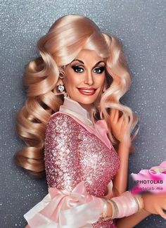 a barbie doll with blonde hair and pink dress