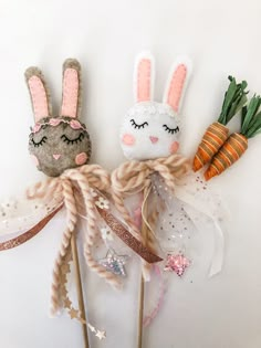 three bunny, carrots and starfish hair clips are on top of each other