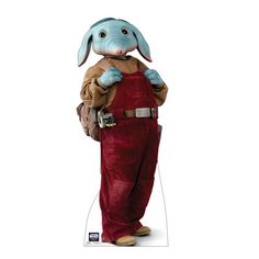 a blue bunny dressed in red overalls and carrying a brown bag is standing on a white background