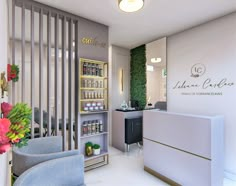 the interior of a nail salon with flowers in vases on the counter and chairs