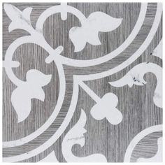 an image of a white and grey wallpaper with floral designs on the back side