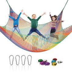 two children are jumping in a hammock made out of string and plastic beads