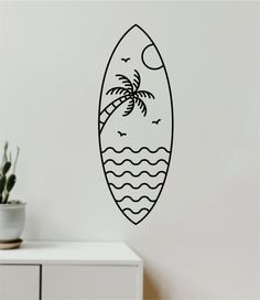 a wall decal with a palm tree and ocean waves on the bottom half of it