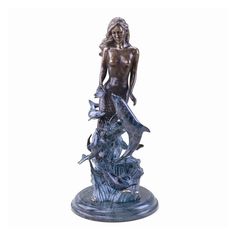 a bronze statue of a woman with dolphins