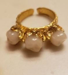 Trio tooth ring on gold coated brass bands.  Adjustable  (comfortable up to size 8.5 ish; message to customize larger sizes! ) Engament Rings, Tooth Ring, July Baby, Teeth Jewelry, Brass Band, San Antonio Tx, Flower Ring, Rings Statement, Gold Leaf