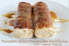 two pieces of bread covered in gravy on a white plate with caramel drizzle