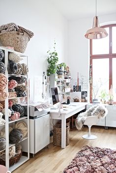 a room filled with lots of different types of yarn