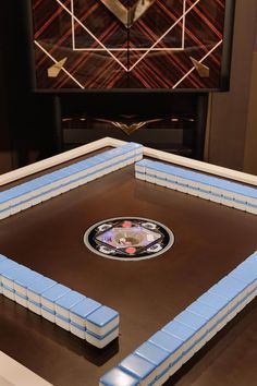 a close up of a foosball game on a table