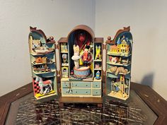 an assortment of toy furniture on display in a room