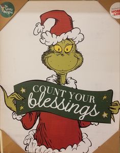 the grinch is holding a sign that says, count your blessings on it