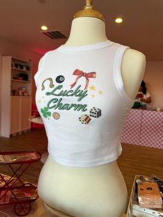 Trendy shamrock crop top aesthetic scottsdale local boutique old town scottsdale unique gifts scottsdale souvenirs shamrock nipple crop top trendy baby tee 2024 st. pattys day st patrick's day st patricks day scottsdale trendy clothes scottsdale golf waste management open scottsdale boutique spice scottsdale things to do in scottsdale gift shop in scottsdale visit scottsdale az arizona things to do best store scottsdale scottsdale bachelorette itinerary pink boutique scottsdale cute trendy clothes scottsdale asu students arizona asu aesthetic scottsdale living lucky charm mach 2024 spring trends clover nipple crop top lucky girl aesthetic bow aesthetic trendy clothing inspo st pattys day outfit inspo St Pattys Day Bachelorette, Lucky Charm Aesthetic, College St Patricks Day Outfit, Lucky Me Bid Day Theme, Asu Aesthetic, Lucky Girl Aesthetic