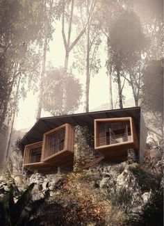 two wooden windows on the side of a house in the woods with rocks and trees