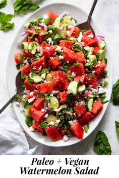 a salad with watermelon, cucumber and feta cheese